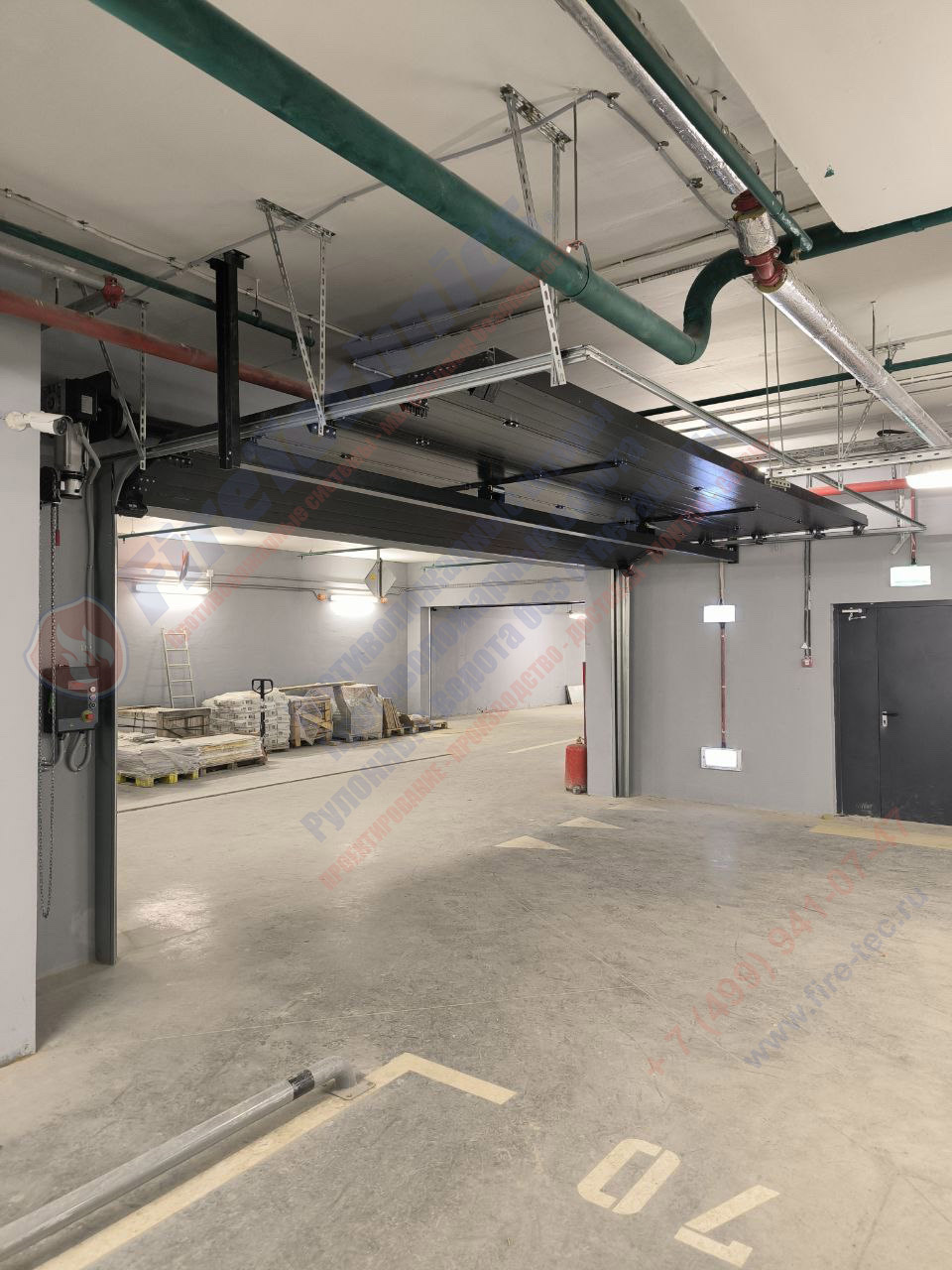 Секционные противопожарные ворота FireTechnics-S EI60 в паркинге ЖК